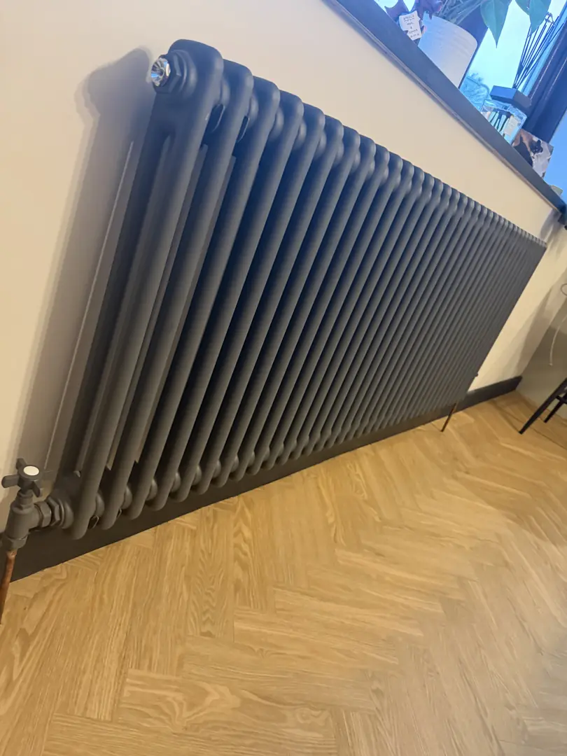 Column radiator installation in a Porthcawl home by RH Plumbing and Heating