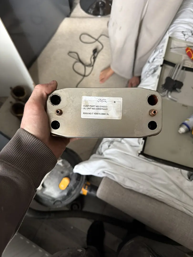 Boiler heat exchanger plate replacement during boiler repair in Bridgend