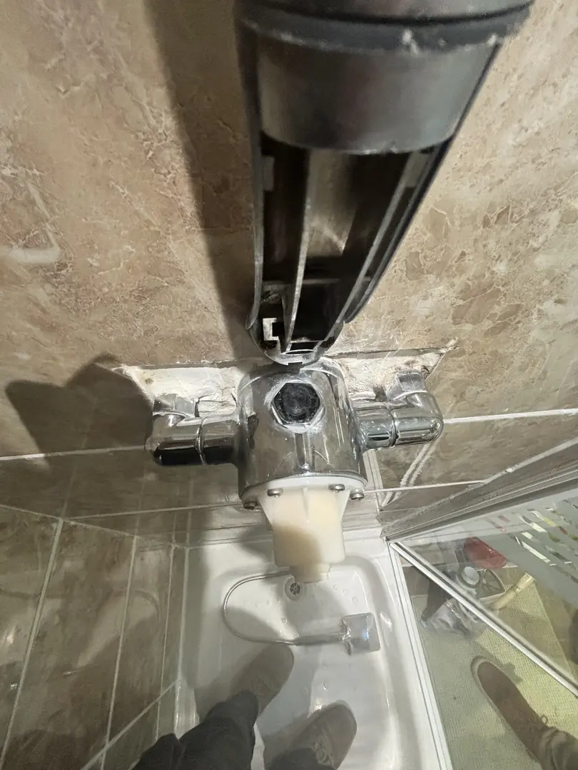 Shower mixer valve repair by plumber in Bridgend
