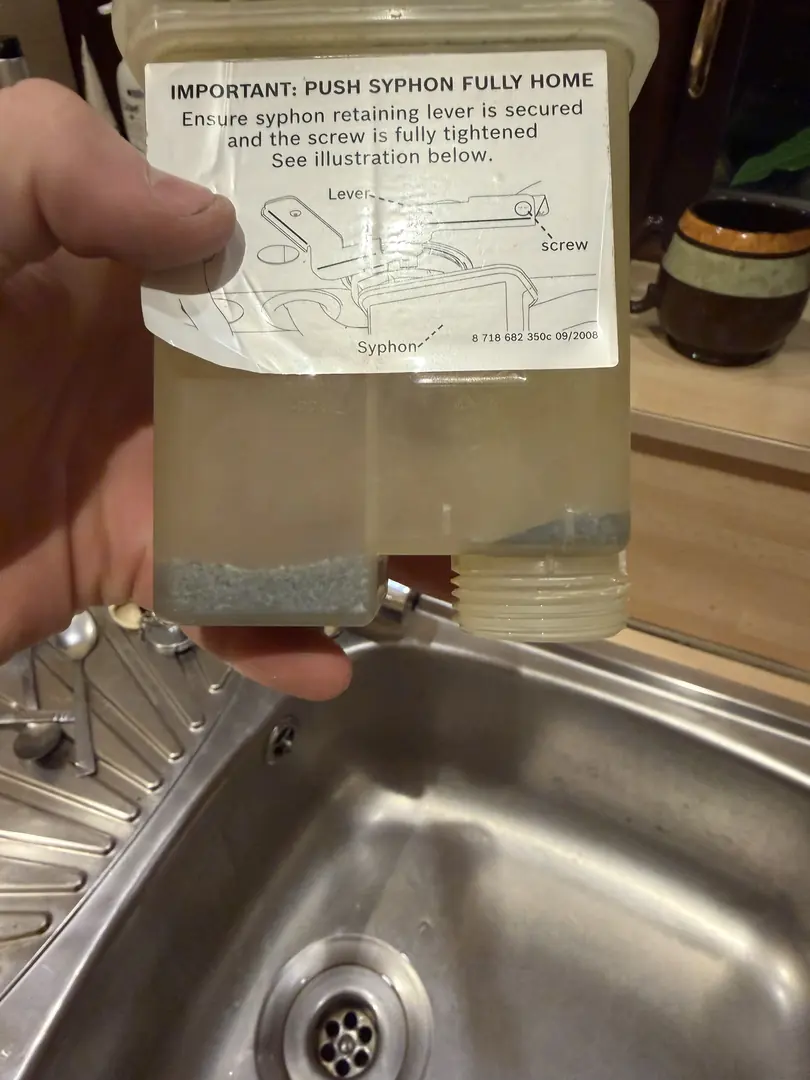 Toilet syphon flush valve repair by plumber in Bridgend