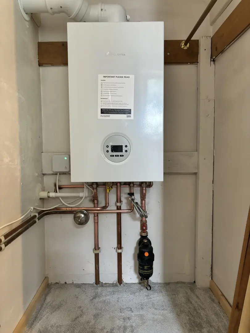 Worcester Bosch boiler installation with magnetic filter by heating engineer in Bridgend