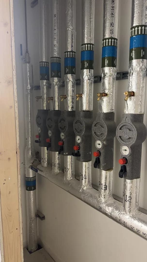 Insulated MVHR manifold with flow meters ready for commissioning in Bridgend